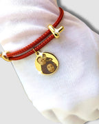 Pulsera cordón rojo con foto y mensaje