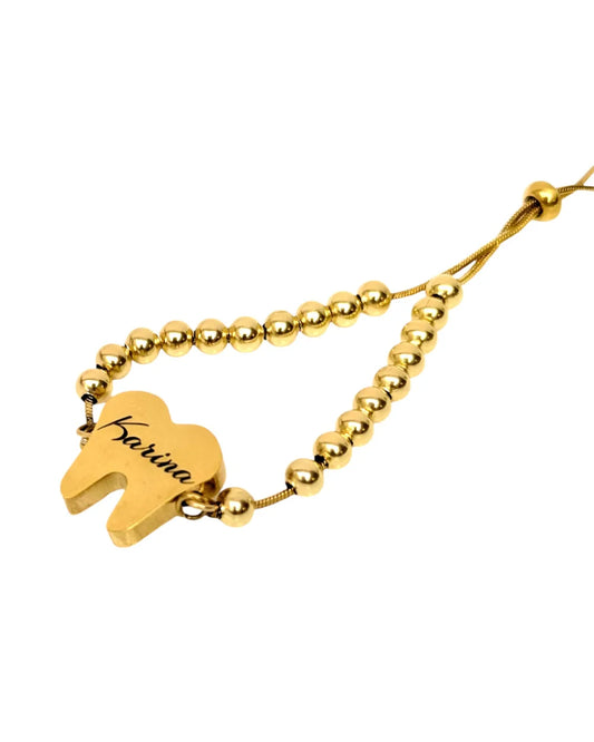 Pulsera Odonto Love: Pulsera en forma de diente de acero con mensaje personalizado