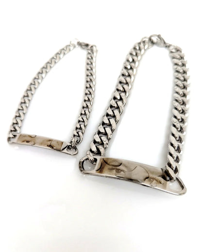 Miradas Gemelas: Pack 2 pulseras de acero de mirada de pareja y mensaje atrás