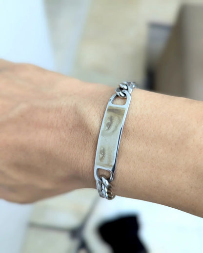 Miradas Gemelas: Pack 2 pulseras de acero de mirada de pareja y mensaje atrás